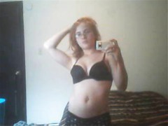 Find-Best-Pantyhose.com presents: Redhead lily cooper caressing her soft body in front of the mirror