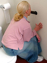 Find-Best-Pantyhose.com presents: Blonde girl Jamie sits on the toilet and blows a black gloryhole dong
