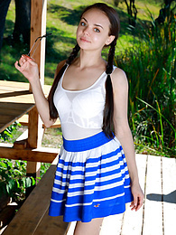 Find-Best-Pantyhose.com presents: Fresh-Faced russian beauty Mia Grandy gets totally naked on a picnic table in a garden